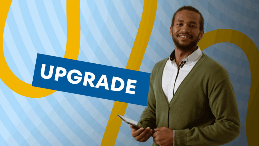 Black male teacher holding a tablet, with 'Upgrade' written in the background